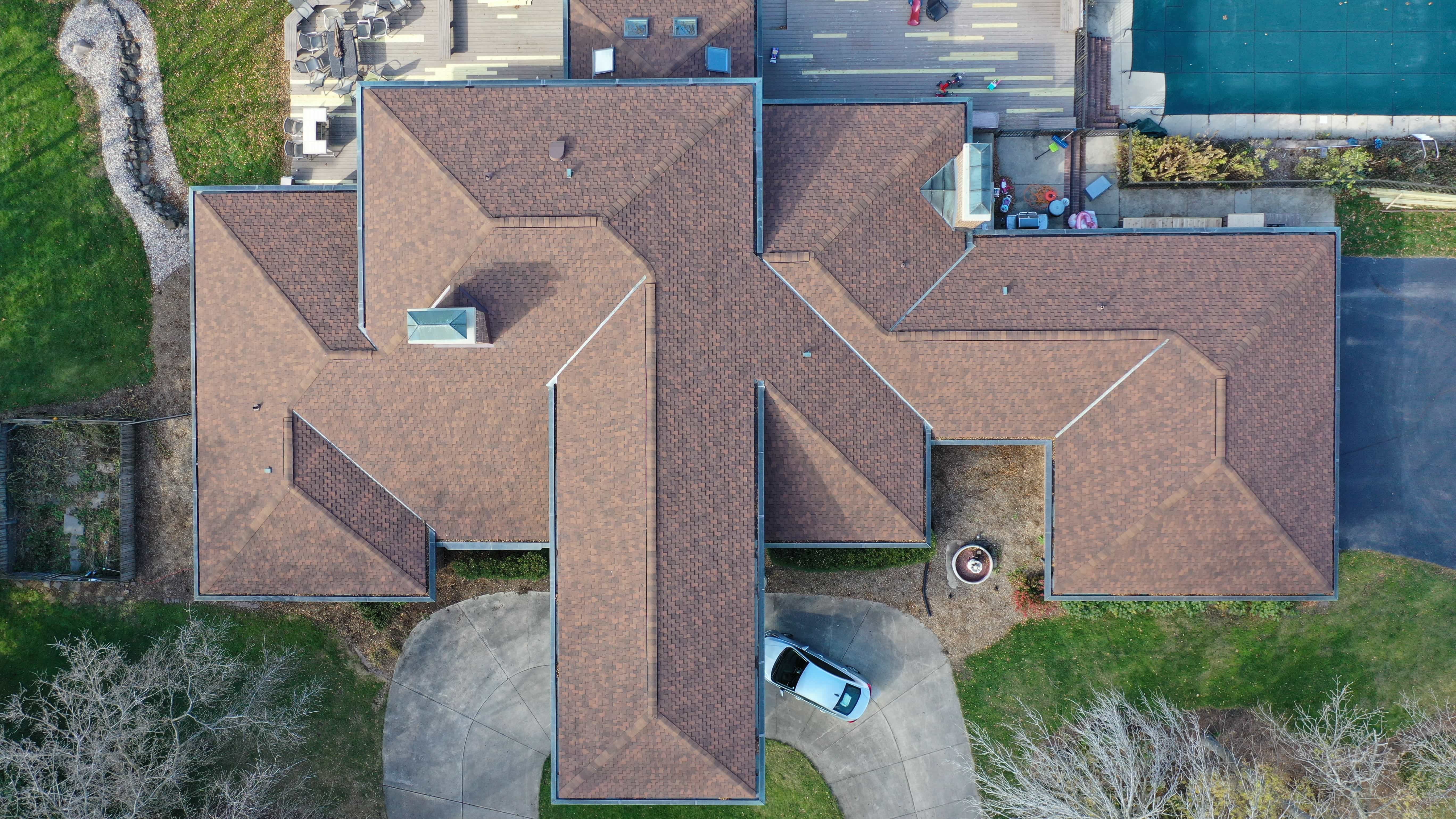 After we completed roofer project on the house, with beautiful new shingles. 