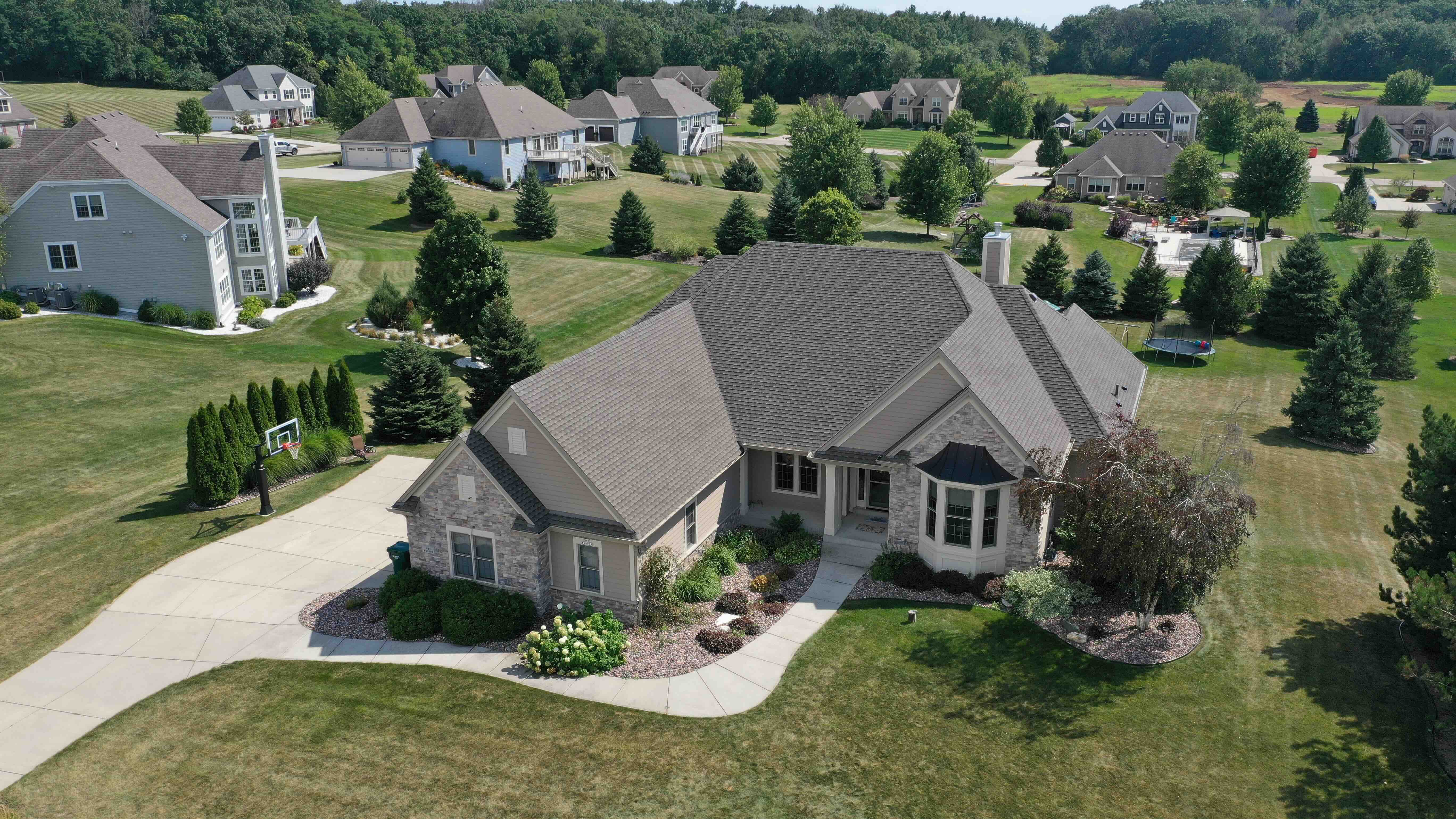 Milwaukee roof replacement completed by Ridge Top Exteriors featuring architectural asphalt shingles with improved curb appeal and durability