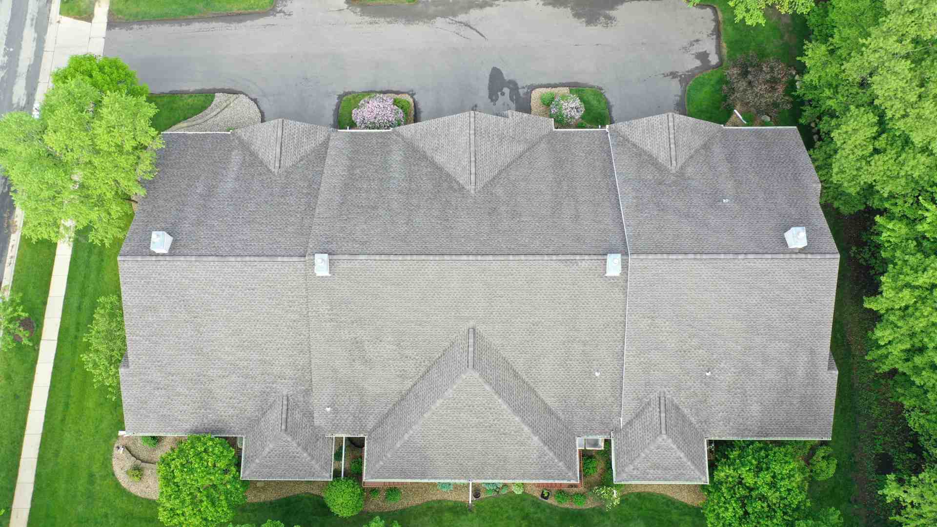 Complex roof with multiple dormers and valleys - How Much Does Roofing Cost In Milwaukee?